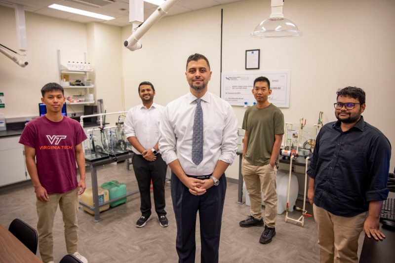 The ACWA Team (from left): Justice Lin, Ajay Kulkarnk, Feras A. Batarseh, Chhayly, and Siam Maksud. (Not pictured, Reilly Oare). Photo by Tim Skiles for Virginia Tech.