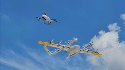 two drones in the sky pass each other