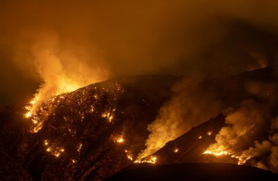 A wildfire seen at night. Image courtesy Pexels.