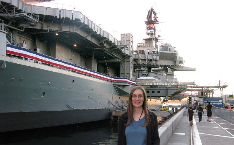 Christy Cochrane picture in front of a ship.