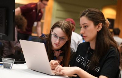 Game faces on. Participants put their cybersecurity skills to the test at Cyber Fusion 2023, a Commonwealth Cyber Initiative-supported event that gathered students and faculty advisors from across Virginia to participate in a capture-the-flag competition, attend a job fair, and learn from experts. Photo by H. Lockwood McLaughlin for Virginia Tech.