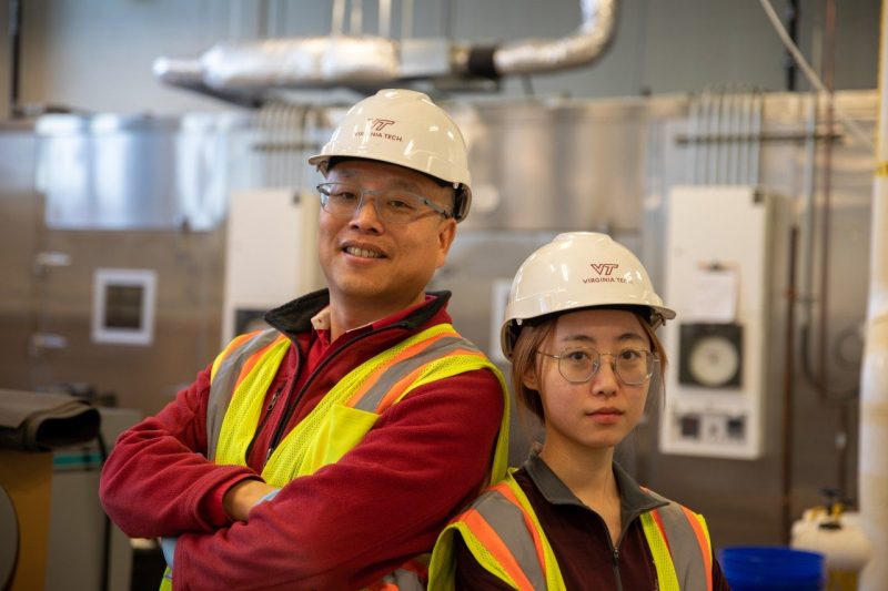 Zhiwu "Drew" Wang (at left) and Ph.D. student Xueyao "Kira" Zhang in Wang's lab in the Human and Agricultural Biosciences Building I, where the applied research on bioplastics is conducted. Photo by Max Esterhuizen for Virginia Tech.